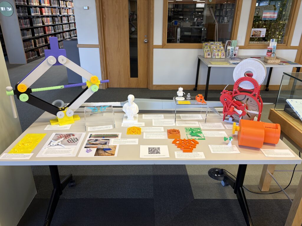 Photo of 3D printed objects from a display/exhibit on uses and designs of 3D prints